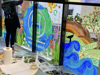 An artist paints on a large window, creating a colorful illustration that features the Earth and the B Corp Certification logo.
